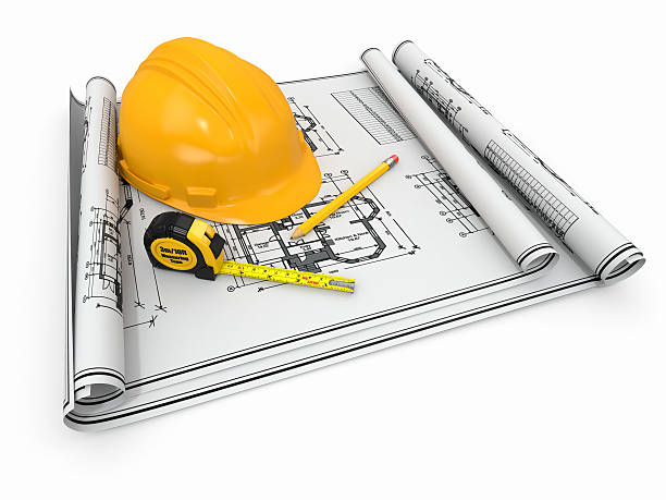istock Construction concept. Hardhat, blueprint and rulers. 147789576