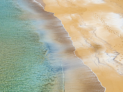 High angle view of sand and wave patterns