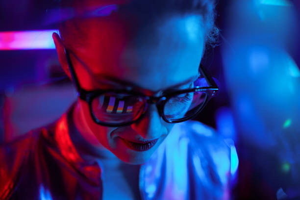 istock modern woman with charts reflecting in glasses 1477901335