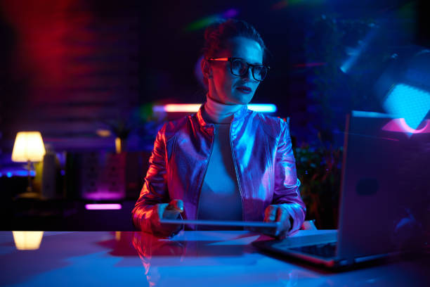 istock pensive modern 40 years old woman in glasses using tablet PC 1477901341