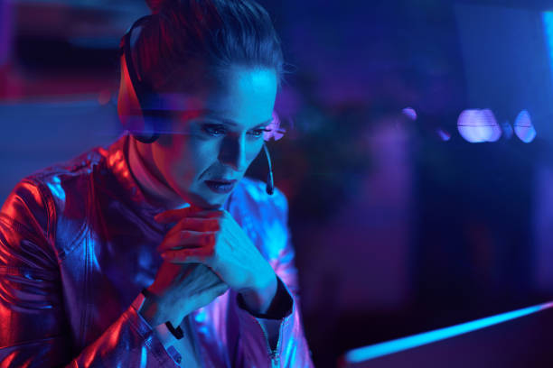 istock pensive elegant female with laptop talking video call 1477901357