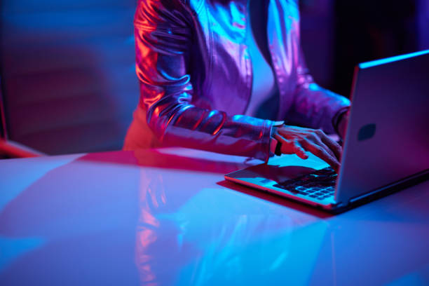 istock Closeup on female with laptop in office 1477901359