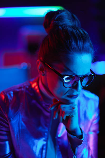 istock pensive modern female in glasses 1477901368