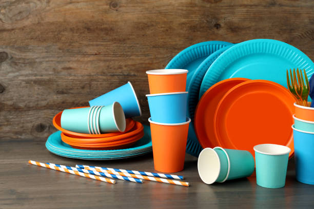 istock Set of bright disposable tableware on wooden table 1477902706