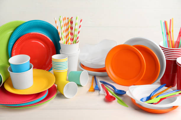 istock Set of disposable tableware on white wooden table 1477902718