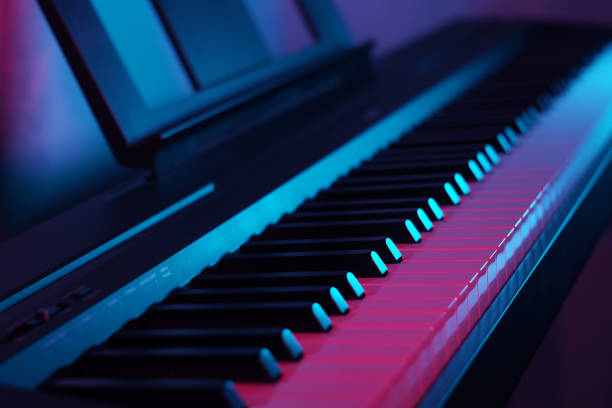 istock Neon close-up modern piano keyboard 1477903814