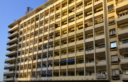 Dakar, Senegal: façade pattern of the Allumettes / Cafal building, so named after the now extinct 'CAFAL Allumettes Senegal' company, a manufacturer of matches ('allumettes' in French) - large mixed use colonial building, houses offices, commerce, institutions, apartments, etc. - Independence Square, formerly Admiral Auguste-Léopold Protet square.