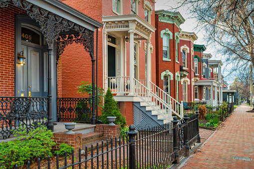 Traditional houses in downtown Richmond, Virginia, USA on a cloudy day.