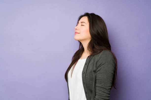 istock Relaxed caucasian woman closing her eyes relaxing 1477916819