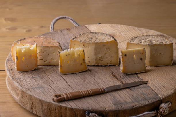 istock close up of maturated selection of cheese on old wood 1477917708