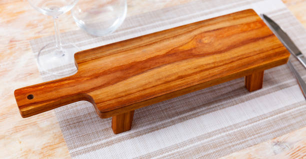 istock Empty natural wooden board for serving of breakfast 1477924761