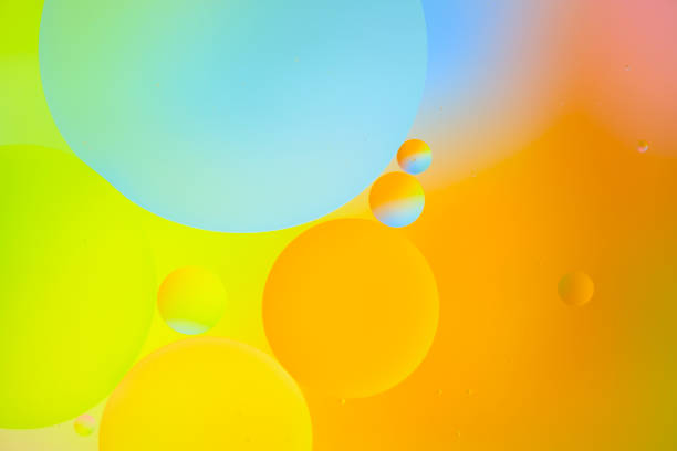istock Polka dots floating on a colorful background 1477938973