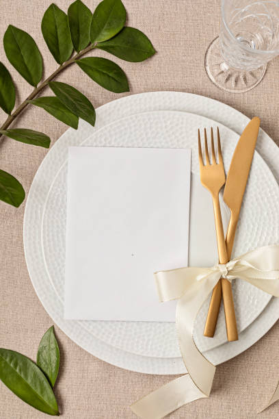 istock Festive wedding, birthday table setting with golden cutlery 1477940700