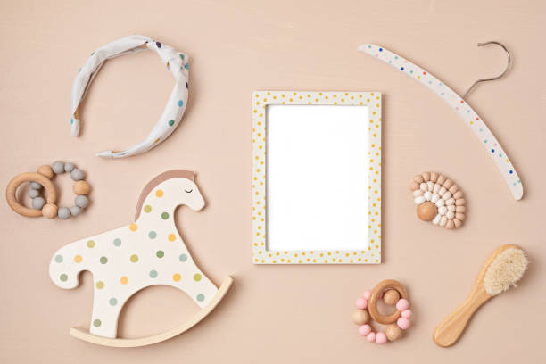 istock Mockup of empty frame with eco friendly baby accessories 1477940765