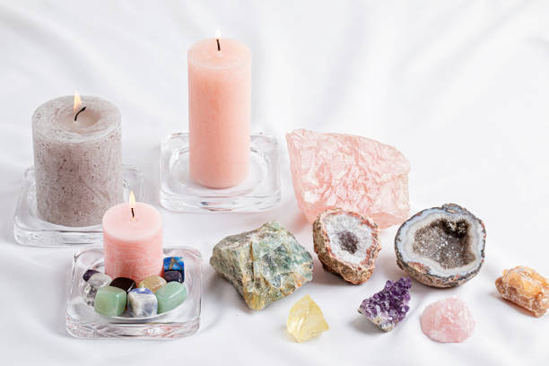 istock Healing reiki chakra crystals over fabric background. Gemstones for wellbeing, harmony, meditation, relaxation, metaphysical, spiritual practices. Energetical power concept 1477940800
