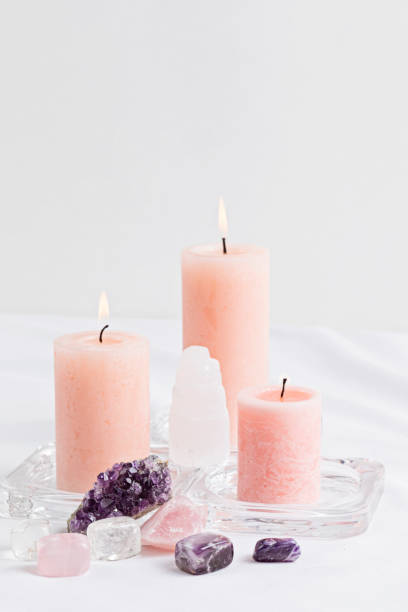 istock Healing reiki chakra crystals over fabric background. Gemstones for wellbeing, harmony, meditation, relaxation, metaphysical, spiritual practices. Energetical power concept 1477940831