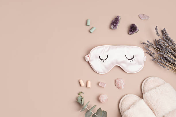 istock Healing chakra crystals, lavender and sleeping mask. Improving sleep quality with gemstones. Natural treatment of insomnia 1477940843