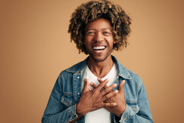 istock Sincere black man touching chest 1477941324