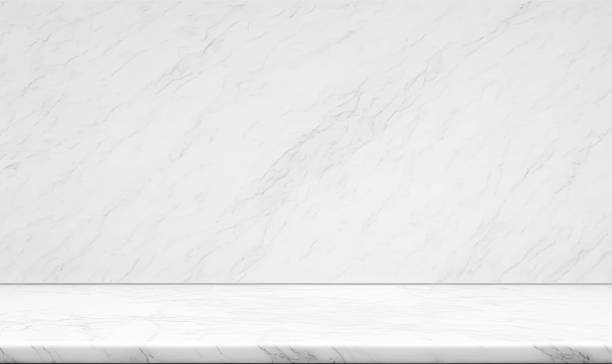 istock Empty white marble table top on white wall mock up banner abstract background for display your packaging or mockup design template,3d rendering 1477944157