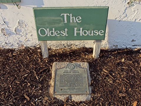 Saint Augustine, FL - USA, March 1, 2023. Sign of the Gonzalez Alvarez house or oldest house in Saint Augustine Florida. This historic property dates from 1727 and has been around during 2 Spanish occupations, a British and current American. Tours are offered of the structures and surrounding area.