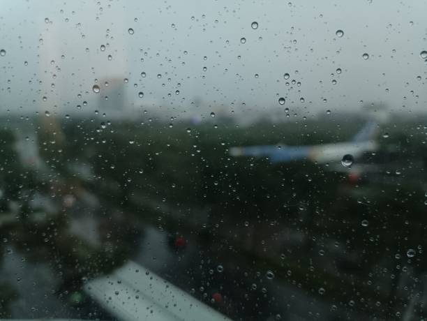 Rain droplet on the window glass, rainy day