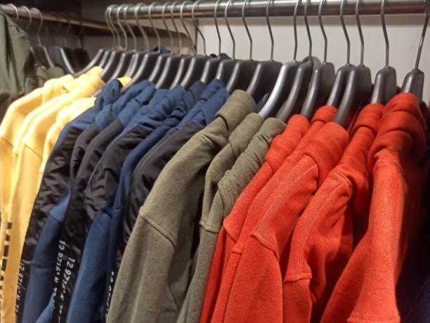 istock sweatshirts winter clothing on hangers 1477958814