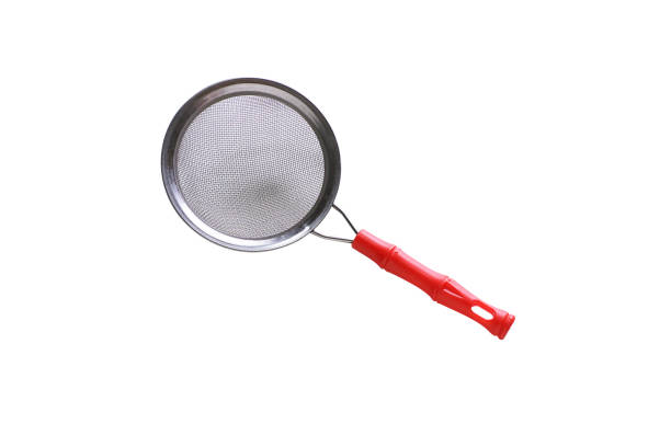 istock Colander for cooking isolated on white background, cooking equipment, mesh used to filter or drain water. 1477963410