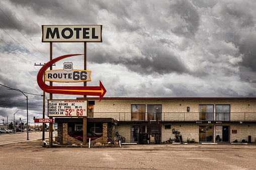 Kingman, Arizona, USA - March 11, 2023: Arizona skies over the newly remodeled Route 66 Motel on historic Route 66.