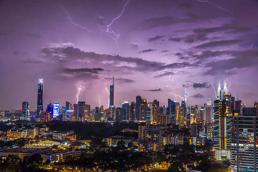 Kuala Lumpur, Malaysia - March 5th, 2023: Stunning image of Kuala Lumpur, lit by dozens of lightning bolts during a severe thunderstorm