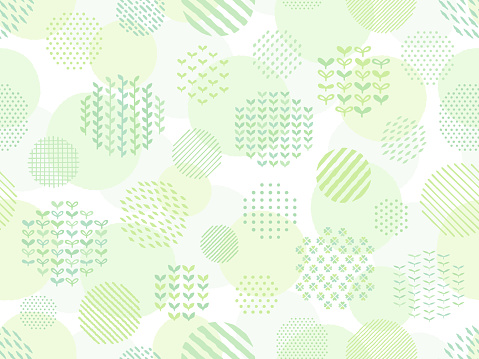 Hand drawn style pattern background of green circles with plants and dot and stripe patterns