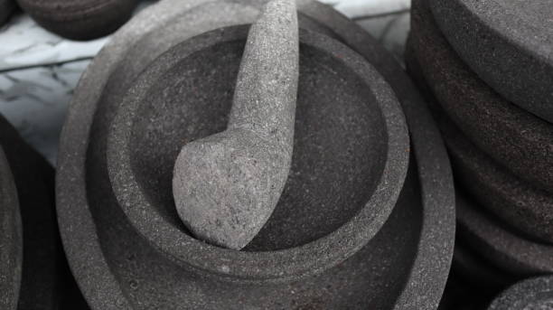 istock Traditional kitchenware named stone mortar and pestle 1477977831