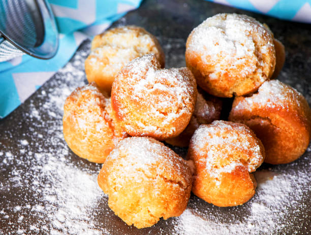 istock Cottage cheese donuts balls on a light background. Top view 1477978113