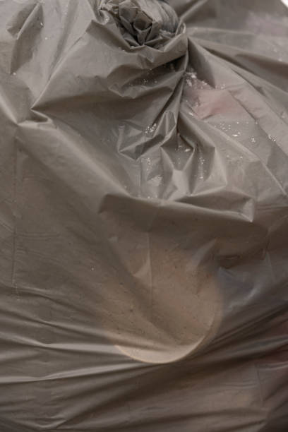 istock trash bag black color garbage waste close up 1477979253
