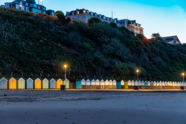istock Beach huts on Bournemouth Beach, Dorset, England 1477980340