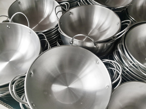 Stack of metallic bowls in a shop