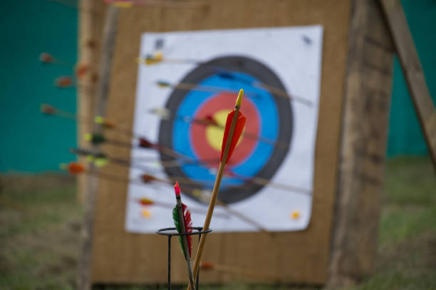 istock Archery arrows in close up and target board 1477988222