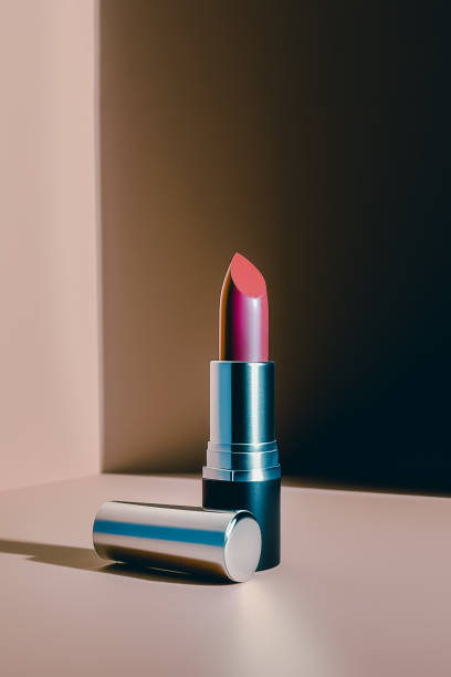 istock Lipstick stand on the table in the sunlight. 1477990576