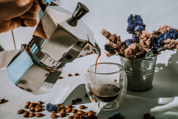 istock Traditional coffee maker. Geyser Coffee Maker. Silver geyser coffee maker. Device for kitchen. aromatic coffee. 1477994512