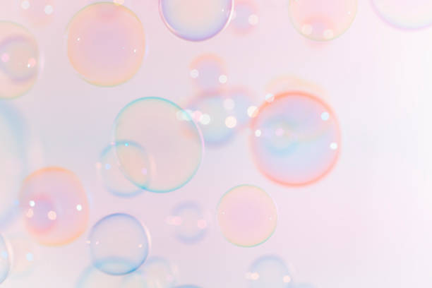 istock Beautiful Pink anad Blue Soap Bubbles Abstract Background. Defocus, Blurred Celebration, Romantic Love ValentinesTheme. Circles Bubbles. Freshness Soap Sud Bubbles Water 1477994561