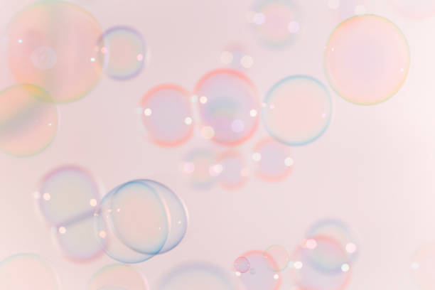 istock Beautiful Pink anad Blue Soap Bubbles Abstract Background. Defocus, Blurred Celebration, Romantic Love ValentinesTheme. Circles Bubbles. Freshness Soap Sud Bubbles Water 1477994562