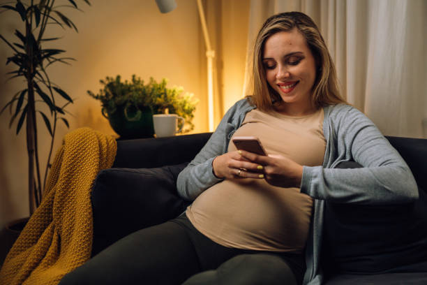 istock pregnant woman at home 1477994755