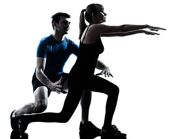 istock aerobics intstructor  with mature woman exercising 147799700