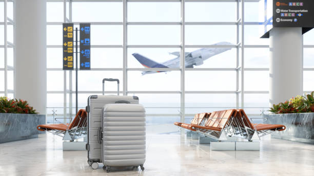 airport waiting area with luggages, empty seats and blurred background - airplane taking off sky commercial airplane imagens e fotografias de stock