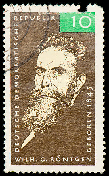 Postage stamp from German Democratic Republic dedicated to Röntgen Postage stamp from German Democratic Republic dedicated to Wilhelm Conrad Röntgen, a German physicist, who, on 8 November 1895, produced and detected electromagnetic radiation in a wavelength range today known as X-rays or Röntgen rays, an achievement that earned him the first Nobel Prize in Physics in 1901. roentgen stock pictures, royalty-free photos & images