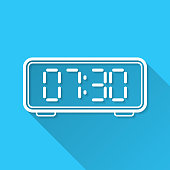 istock Digital clock. Icon on blue background - Flat Design with Long Shadow 1478004845