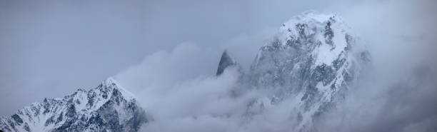 istock Panoramic view Ladyfinger peak covered with Clouds in winter 1478006178