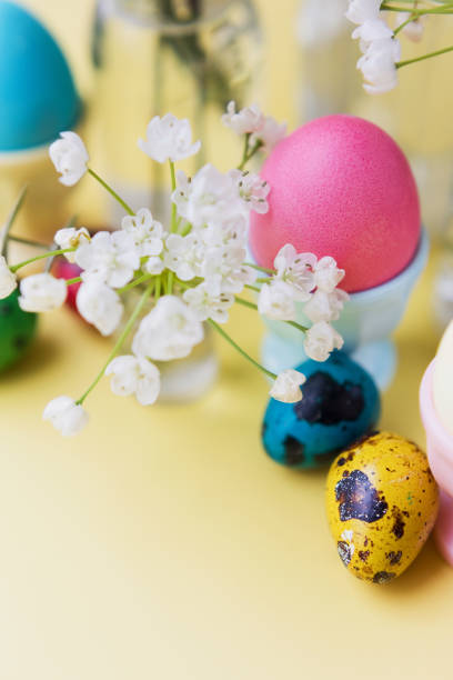 istock Easter eggs, flowers on yellow background 1478006645