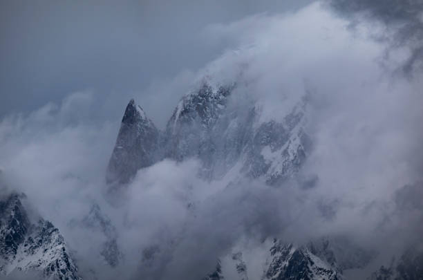 istock Ladyfinger peak covered with Clouds in winter 1478010962
