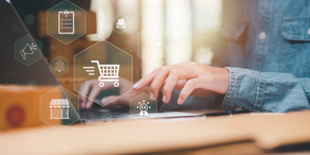 istock Startup or small business entrepreneur,Check sales and check business growth reports,order management in online stores,shopping on the internet,Selling online on Internet,SME,shipping boxes,e-commerce 1478013528