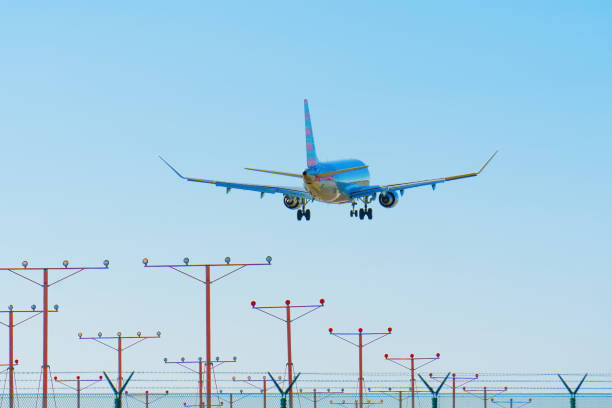 istock Passenger Plane Landing Close-Up 1478015796